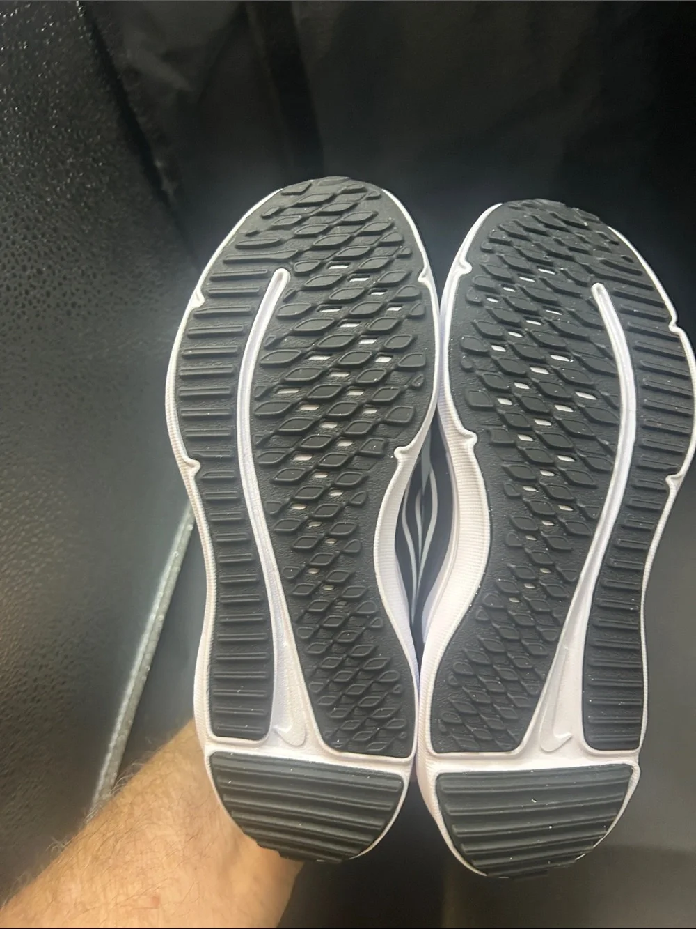 Nike Kids Black Sneakers with White Swoosh